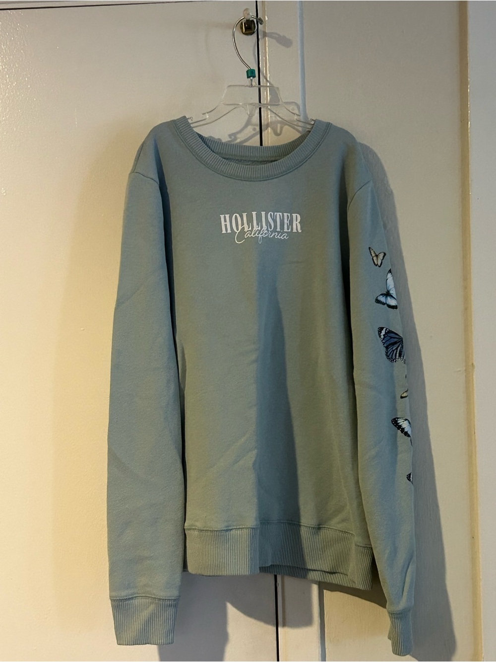 Hollister Women’s Sage Green Crewneck Sweatshirt with Sleeve Butterflies